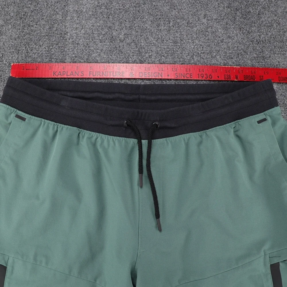 Under Armour Mens XXL Sage Green Cargo Athletic Shorts Fitted Stretch RN 96510